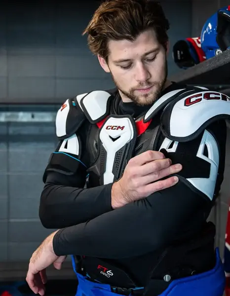 CCM protective gear fitting service showing expert hockey equipment customization and sizing at The Ice Box