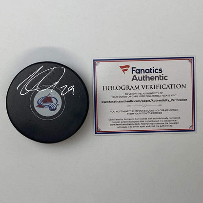 Autographed/Signed Nathan MacKinnon Colorado Avalanches Logo Hockey Puck Fanatics COA