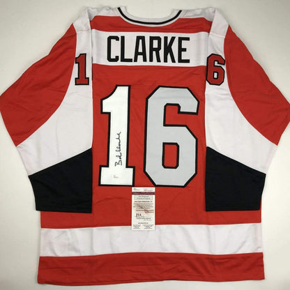 Autographed/Signed Bob Bobby Clarke Philadelphia Orange Hockey Jersey JSA COA