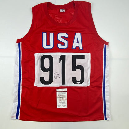 Autographed/Signed Carl Lewis Track Star United States USA Olympics Jersey JSA COA